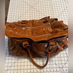 UE NWOT travel bag brief case gold accents